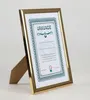 A gold-colored picture frame with a certificate inside, displayed on a white background. Produktbild-Vorschau