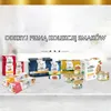 A collection of cat food products displayed on a white surface with a light gray background. Produktbild-Vorschau