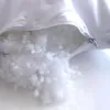 A close-up view of the filling of a pillow, with a zipper partially open. Produktbild-Vorschau