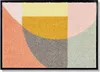 A doormat with a geometric abstract pattern.