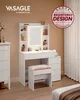 A white vanity table with a lighted mirror and shelves, a pink stool, and a chest of drawers in a room. Produktbild-Vorschau
