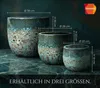 Three ceramic planters of varying sizes are displayed on a dark, reflective surface, with dimensions indicated by measurement lines and text. Produktbild-Vorschau