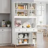 A white kitchen sideboard with glass doors, filled with kitchenware and food items. Náhled obrázku produktu