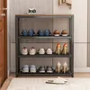 A shoe rack with shoes on display in a hallway. Podgląd zdjęcia produktu
