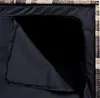 A close-up view of the inside of a storage box, showing the black lining and a partially opened flap. Produktbild-Vorschau