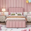 A pink upholstered bed in a child's bedroom with decorative elements. Podgląd zdjęcia produktu
