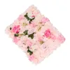 A square floral wall panel with pink and white artificial flowers and green leaves, set against a white background. Podgląd zdjęcia produktu