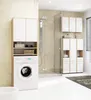 A modern bathroom with a washing machine and storage cabinets. Produktbild-Vorschau