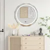 A modern bathroom vanity with a mirror, decor, and a plant. Podgląd zdjęcia produktu