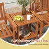 A wooden coffee table with two chairs on a patio. Náhled obrázku produktu