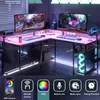 A gaming desk setup with dual monitors, RGB lighting, and various accessories. Anteprima dell’immagine prodotto