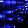 Close-up of blue string lights against a dark background. Náhľad obrázku produktu