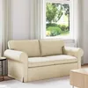 A sofa in a living room setting with a window in the background. Náhľad obrázku produktu