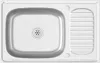A top-down view of a stainless steel sink with a drain and a ribbed drying area. Voir les images du produit