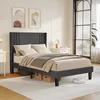 A bedroom scene with a bed, nightstand, and artwork. Produktbild-Vorschau