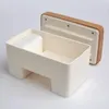 A white butter dish with a wooden lid is shown on a white background. Podgląd zdjęcia produktu