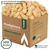A cardboard box filled with natural wood wool firelighters. Produktbild-Vorschau