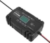 A black battery charger is shown on a white background. Náhled obrázku produktu