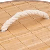 A close-up view of a woven bamboo lid with a rope handle. Náhled obrázku produktu