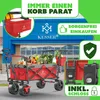 A red foldable wagon filled with groceries is parked in front of a store. Produktbild-Vorschau
