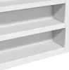 A close-up view of a white shelf unit. Náhľad obrázku produktu