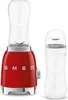 A red SMEG mini-stand mixer with a clear blending cup and a separate clear travel cup. The mixer has silver accents and the SMEG logo is visible. Podgląd zdjęcia produktu