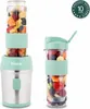 A mini smoothie maker and a portable bottle filled with fruit, displayed against a white background. Produktbild-Vorschau
