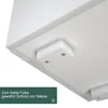 A close-up view of the underside of a white furniture item, showing its feet. Náhled obrázku produktu