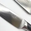 Close-up of a knife blade with branding. Produktbild-Vorschau