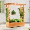 A wooden planter box with a trellis and a roof rack, filled with plants and hanging baskets, sits on a patio. Náhled obrázku produktu