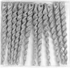 A set of silver glittery icicle ornaments in a clear plastic package. Anteprima dell’immagine prodotto