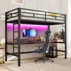 A loft bed with a desk and gaming chair underneath, illuminated by pink LED lights. Produktbild-Vorschau