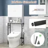 A bathroom cabinet designed to fit over a toilet, with various features highlighted. Produktbild-Vorschau