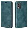 A teal flip-style phone case for a Nokia C32 is shown from two angles against a white background. Produktbild-Vorschau
