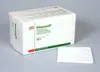 A product box of Vliwasoft wound dressing with a single dressing laid out in front of it. Podgląd zdjęcia produktu