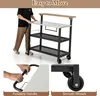 A person is shown pushing a multi-tiered serving cart with a foldable tabletop. Close-up shots highlight the foldable handle and smooth wheels. Náhled obrázku produktu