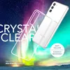 A clear phone case is shown in front of a colorful aurora borealis background. Produktbild-Vorschau