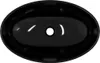 A top-down view of a black oval sink with a drain hole in the center. Anteprima dell’immagine prodotto