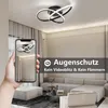 A modern living room with a stylish ceiling lamp, shown both in the room and on a smartphone screen. Produktbild-Vorschau