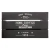 A black wooden crate with white text and graphics. Podgląd zdjęcia produktu