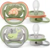 Two pairs of baby pacifiers with animal designs. Produktbild-Vorschau