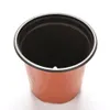 An empty terracotta-colored plastic plant pot with a black rim, shown from a top-down perspective against a white background. Produktbild-Vorschau