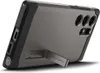 A close-up, angled view of the back of a smartphone case with a kickstand. Náhled obrázku produktu