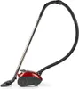 A red canister vacuum cleaner with a silver wand and a black hose, displayed against a white background. Náhľad obrázku produktu