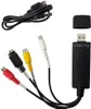 A black video grabber device with attached RCA cables and a USB cable, laid out on a white background. Náhled obrázku produktu