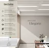 A modern interior scene with a wall displaying text and a product detail section on the left. Produktbild-Vorschau