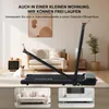 A foldable treadmill is set up in a living room with a couch and a cat nearby. There are also smaller inset images of a couch and a TV stand. Produktbild-Vorschau