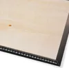 A close-up view of a wooden workbench with a ruler marking along the edge. Náhled obrázku produktu
