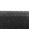 A close-up, cross-section view of a black fitness floor tile, showing its layered texture. Anteprima dell’immagine prodotto