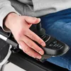 A person's hand is operating a joystick control on a wheelchair. Náhľad obrázku produktu